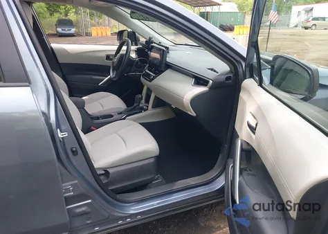 2023 Toyota Corolla Cross L from USA, damaged, VIN 7MUAAAAGXPV060044